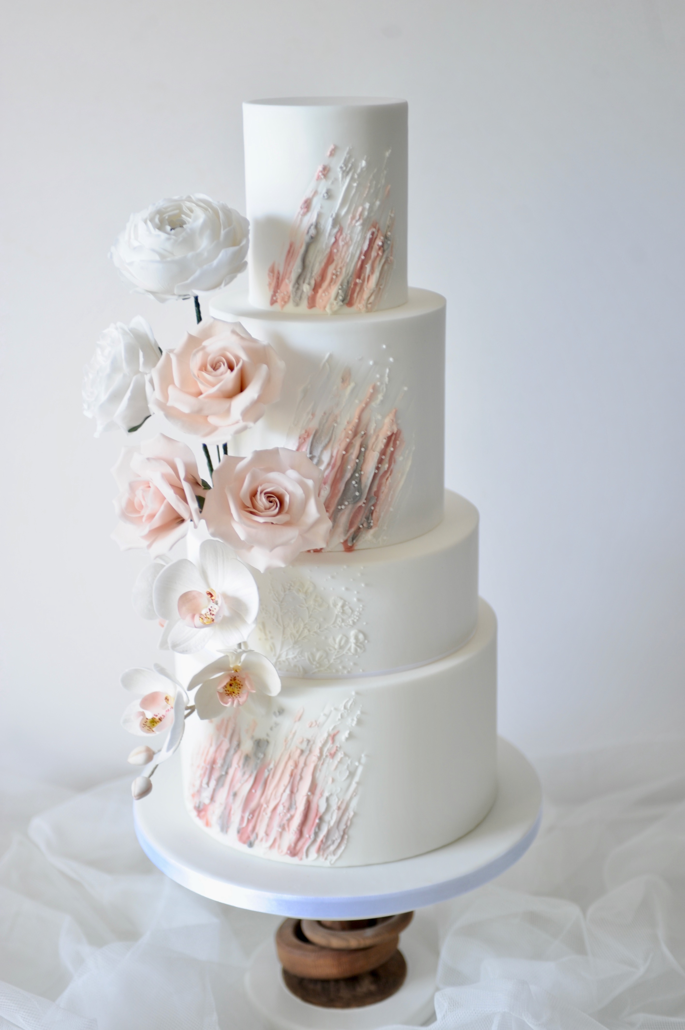 textured buttercream cake with sugar flowers